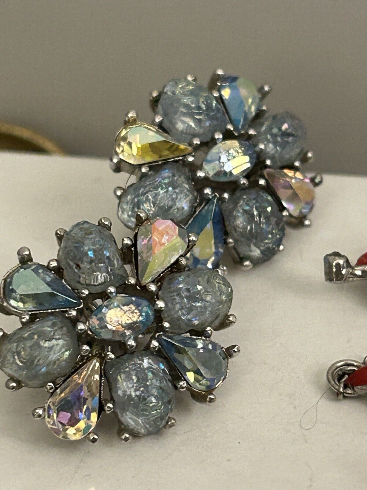 Vintage Trifari Earrings “Etoile" GLASS Blue AB Lava Rhinestone Rhodium Plated - Vintage Jewelry Collective