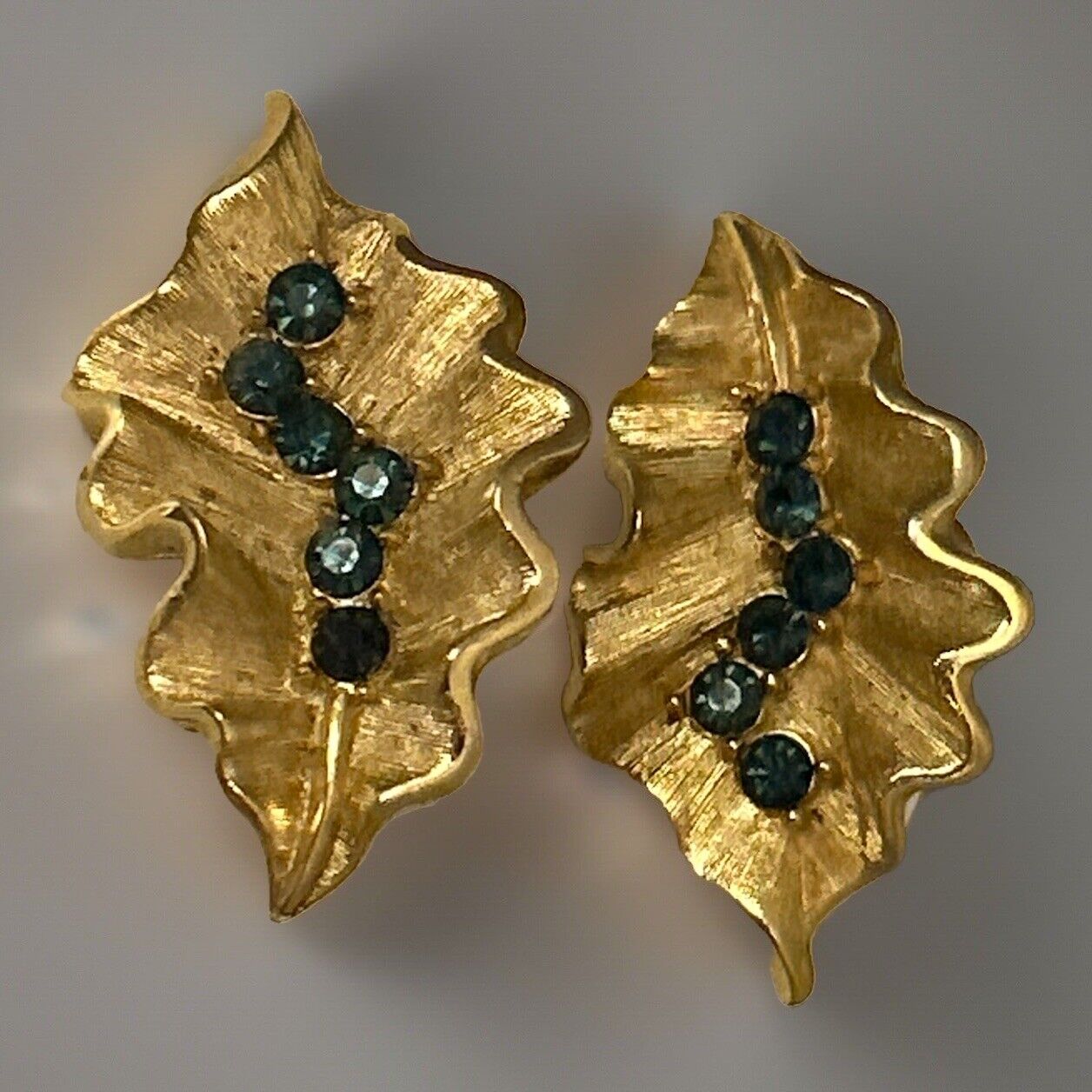 Vintage Crown Trifari Earrings Montana Blue & Gold Rhinestones Ruffled Leaf - Vintage Jewelry Collective