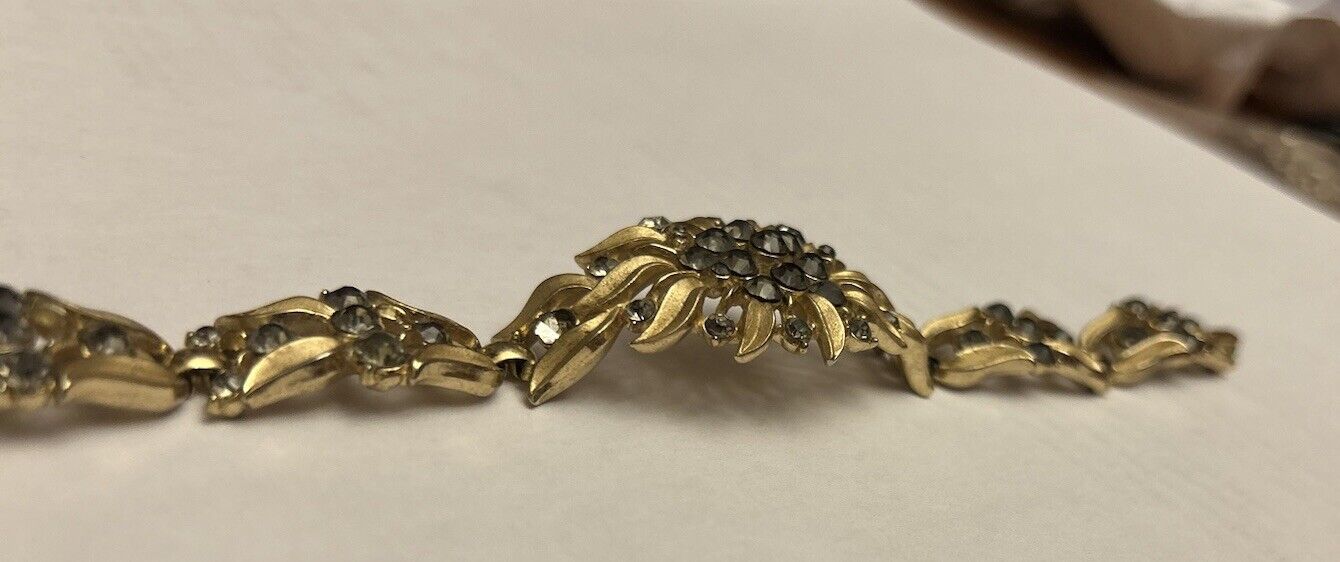 Vintage Trifari Smoke Gray Rhinestone Spray Bracelet Matte Gold Tone - Vintage Jewelry Collective