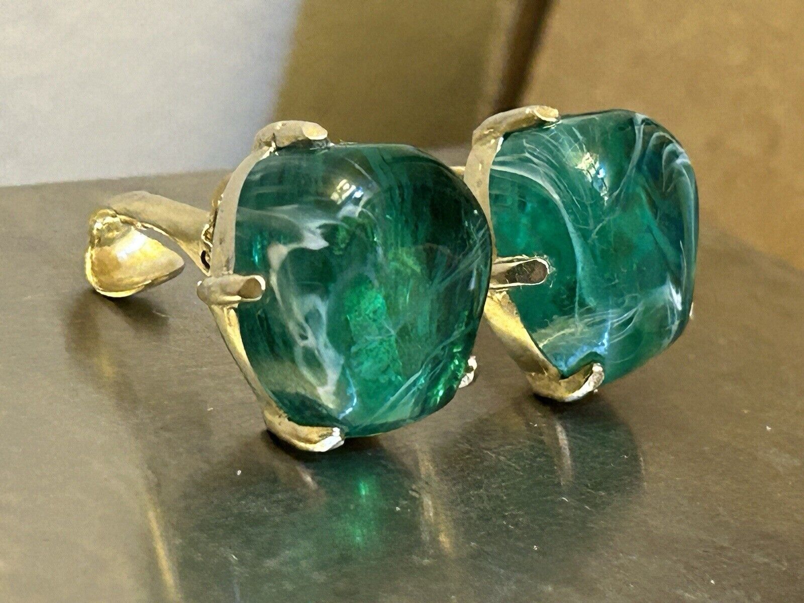 Vintage Flawed Emerald Glass Rhinestone Clip Earrings Signed Can’t Make Out - Vintage Jewelry Collective