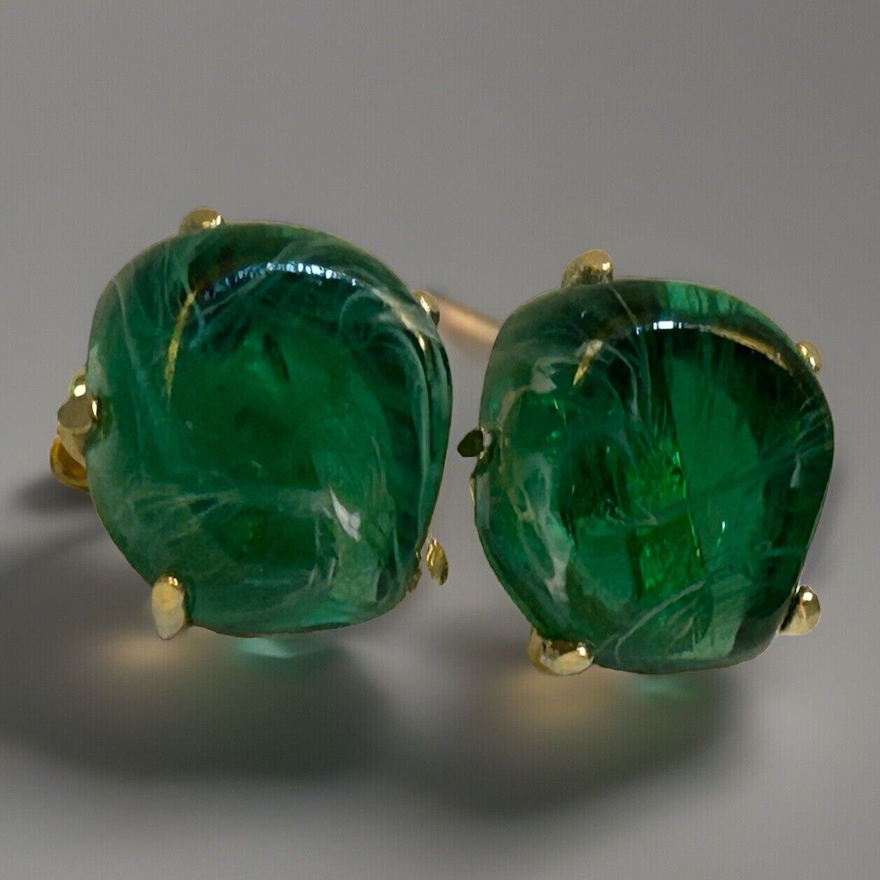 Vintage Flawed Emerald Glass Rhinestone Clip Earrings Signed Can’t Make Out - Vintage Jewelry Collective