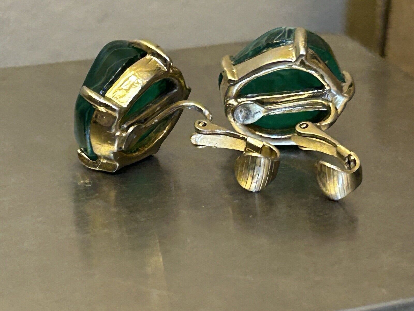 Vintage Flawed Emerald Glass Rhinestone Clip Earrings Signed Can’t Make Out - Vintage Jewelry Collective